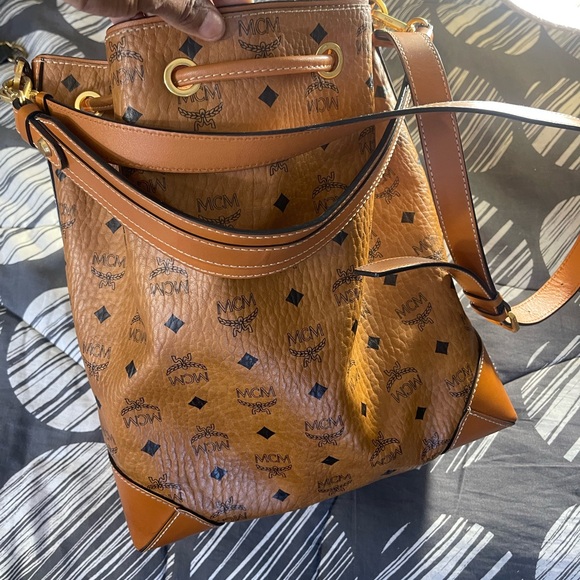 Hello posh I’m having a huge yard sell so I’m selling a lot items name brand MCM - Picture 3 of 8